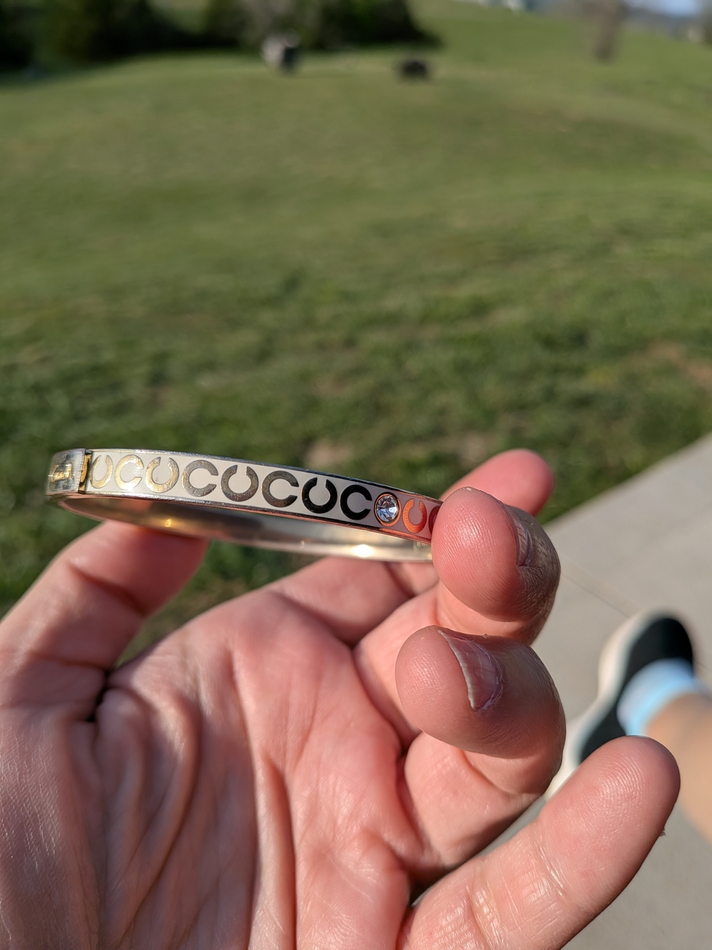 Coach Gold-Tone Logo Bangle‎ Bracelet with Crystal Accent